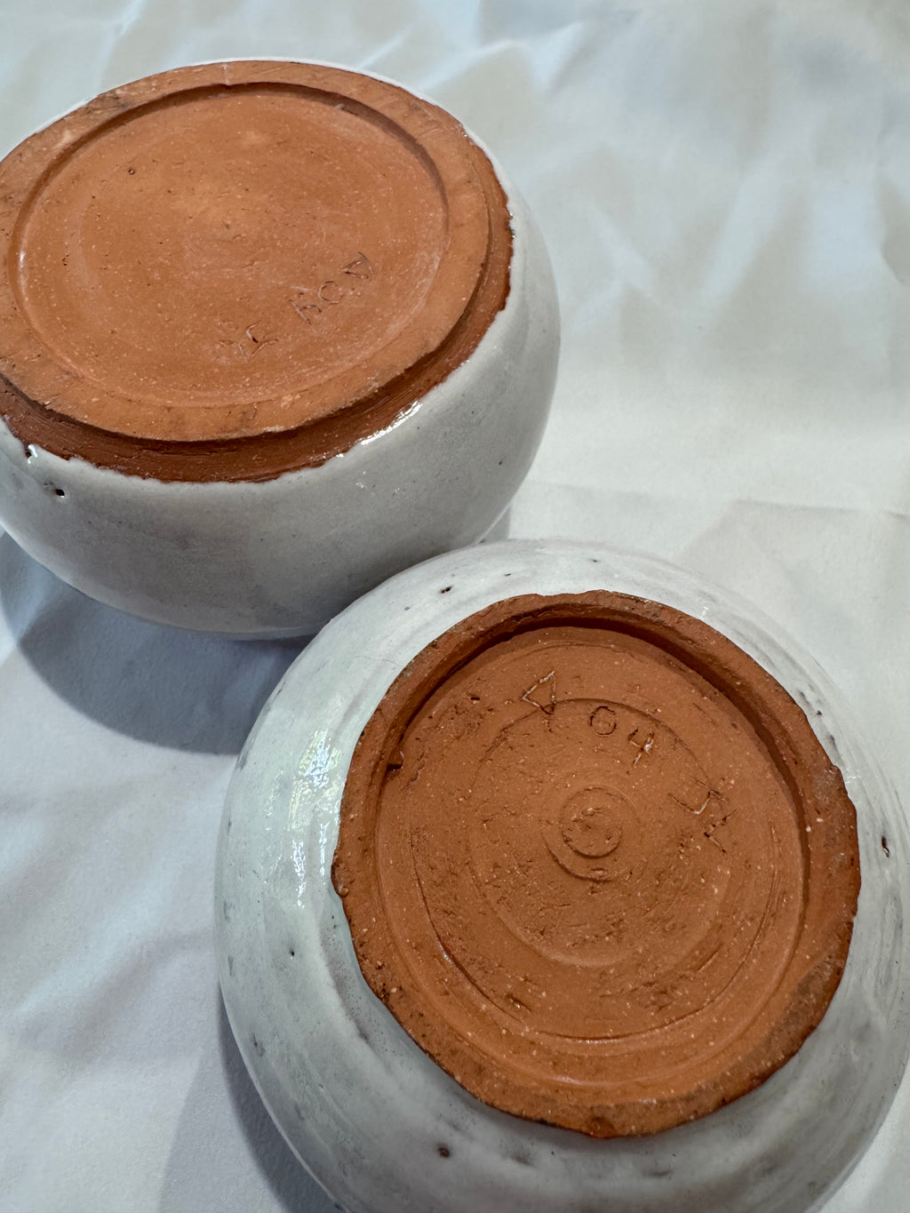 Two handmade ceramic vessels