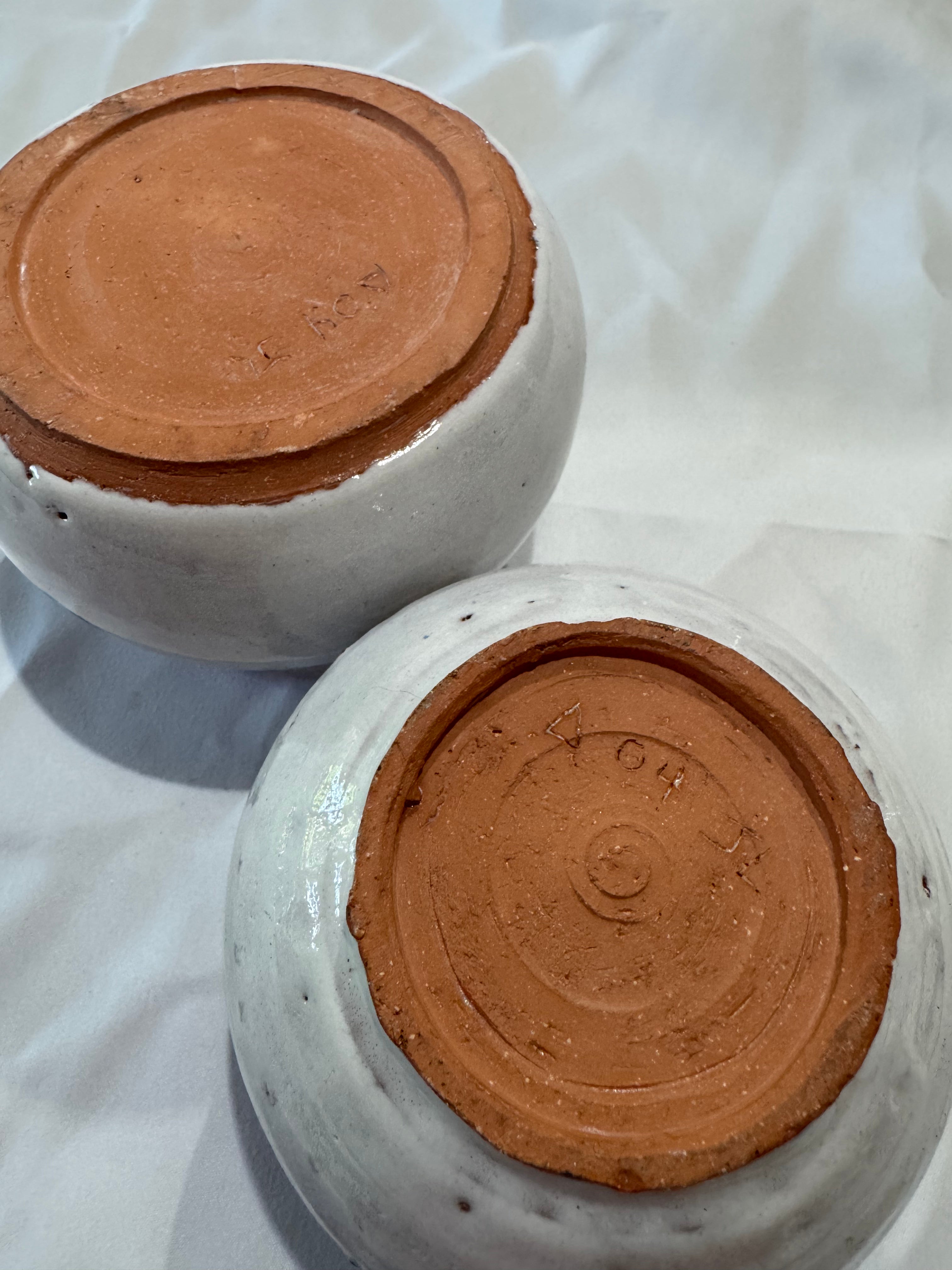 Two handmade ceramic vessels
