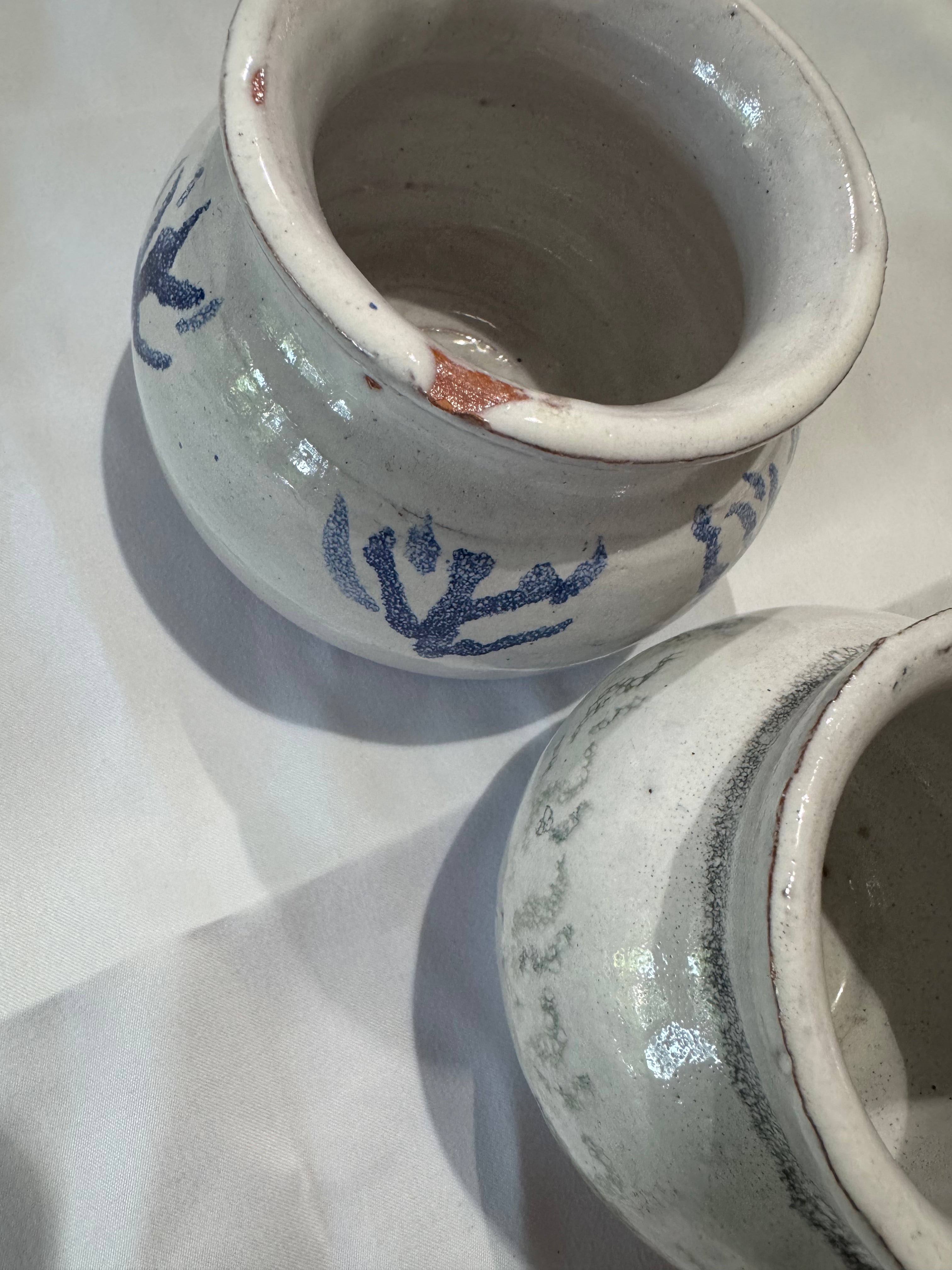 Two handmade ceramic vessels